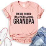 im not retiret im a proffessional grandpa t shirt heather peach