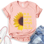 in a world full of roses be a sunflower t shirt heather peach